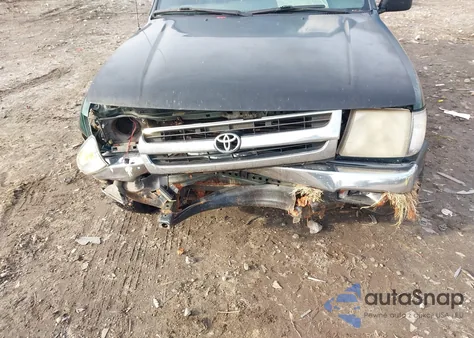 1999 Toyota Tacoma from USA, damaged, VIN 4TANL42N0XZ561426